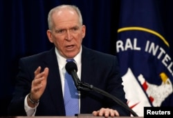 Director of the Central Intelligence Agency (CIA) John Brennan talks to the press during a rare news conference at CIA headquarters in Virginia, Dec. 11, 2014.