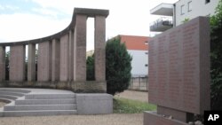 Names on a stone, in memory of 86 Jews killed for Nazi medical experiments at the university of Strasbourg during World War II, are pictured at the Jewish cemetery in Cronenbourg near Strasbourg, eastern France, July 20, 2015. 