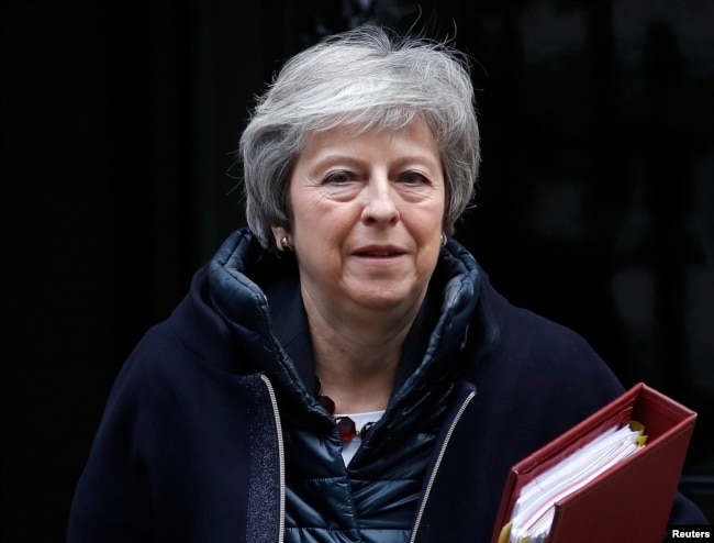 Britain's Prime Minister Theresa May leaves 10 Downing Street in London, Britain, Nov 21, 2018.