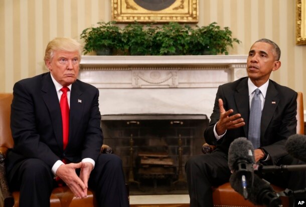 FILE - President Barack Obama meets with President-elect Donald Trump in the Oval Office of the White House in Washington, Nov. 10, 2016.