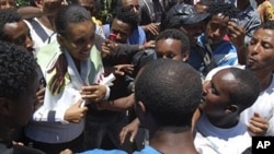 Prominent opposition figure Birtukan Mideksa, middle in green jacket, is being greeted by hundreds of her supporters shortly after her release in Addis Ababa, Ethiopia (2010 File)