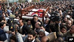 Mourners attend the funeral of Pakistani human rights activist Asma Jahangir in Lahore, Pakistan, Feb. 13, 2018.