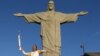 Cristo Redentor com a tocha olímpica nas mãos de Isabel Barroso, antigo voleibolista