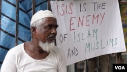 Anti-Islamic State posters are seen around a mosque in Kolkata, India, Dec. 5, 2015. Muslims in India have condemned Islamic State as an un-Islamic group. (Photo - S. Azizur Rahman/VOA)