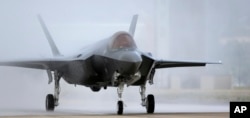 FILE - An F-35 arrives at its operational base at Hill Air Force Base, in the U.S. state of Utah, Sept. 2, 2015.