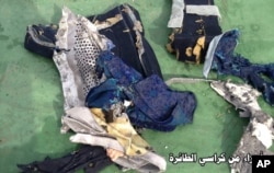 This picture posted Saturday, May 21, 2016, on the official Facebook page of the Egyptian Armed Forces spokesman shows part of a plane chair from EgyptAir flight 804.