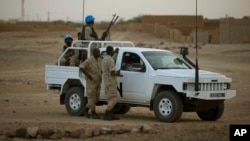 FILE - A vehicle with United Nations peacekeepers is seen in Kidal, Mali.