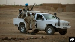 FILE - A vehicle with United Nations peacekeepers is seen in Kidal, Mali.