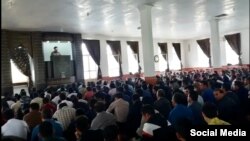 Hundreds of Iranian Kurds attend a Friday prayer service, May 4, 2018, led by imam Mohammad Adibi, a supporter of a 20-day-old protest movement.