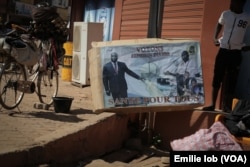 An electoral poster of candidate Zephirin Diabré is displayed on the streets of Ouagadougou, Burkina Faso, Nov. 27, 2015.