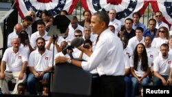 U.S. President Barack Obama delivers remarks on the government funding impasse at M. Luis Construction, a local small business in Rockville, Maryland, near Washington, October 3, 2013. Obama travelled to the business to highlight the impacts that a govern