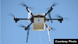 A Flirtey drone makes a delivery in Nevada. The company claims it is the first to establish routine drone delivery services. (Flirtey)