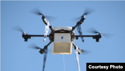 A Flirtey drone makes a delivery in Nevada. The company claims it is the first to establish routine drone delivery services. (Flirtey)