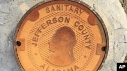 A manhole cover bears the logo/design of Jefferson County, Alabama. Alabama's Jefferson County submitted a second offer to creditors in an attempt to settle its $3.14 billion sewer bond debt, and to avoid what would be the largest municipal bankruptcy in 