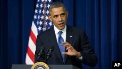 President Barack Obama gestures as speaks at a White House Youth Summit event on December 4, 2013