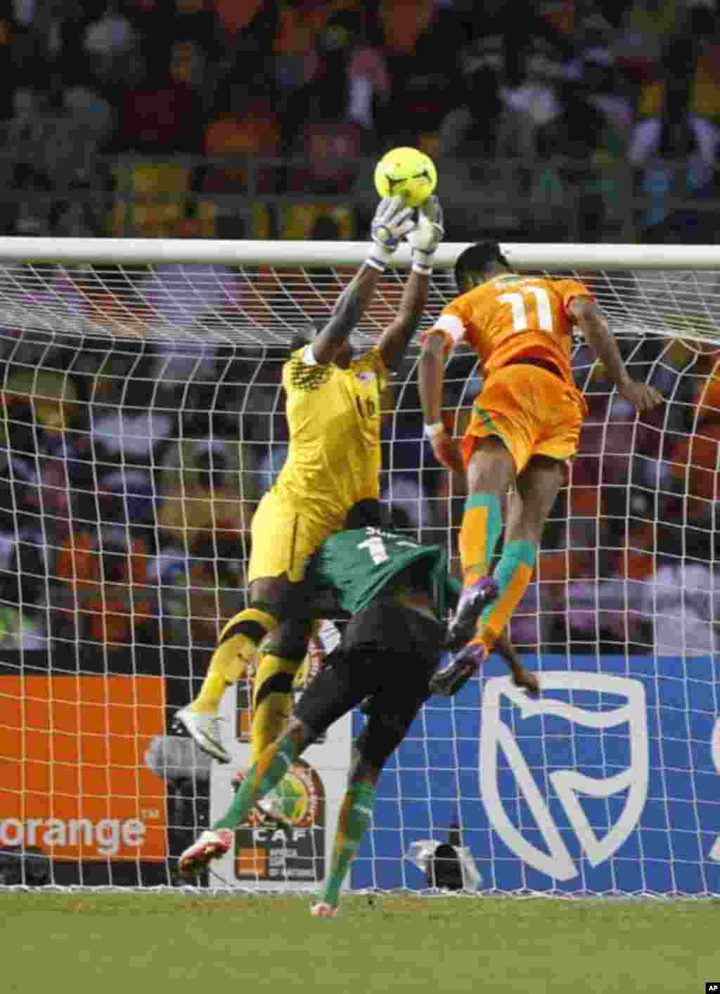Zambia's goalkeeper Kennedy Mweene makes a save against Ivory Coast's Didier Drogba during their African Nations Cup final soccer match at the Stade De L'Amitie Stadium in Gabon's capital Libreville February 12, 2012.