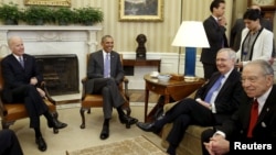 US VP Joe Biden (C) joins President Barack Obama (L) in a meeting with Senate bipartisan leaders at the White House in Washington, March 1, 2016.