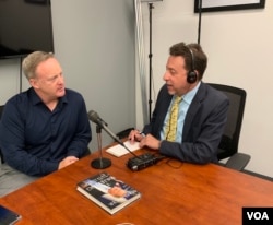 FILE - Former White House Press Secretary Sean Spicer is being interviewed by VOA White House bureau chief Steve Herman, in Arlington, Virginia, June 17, 2019.
