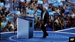 Former Democratic Presidential candidate, Sen. Bernie Sanders, I-Vt., takes the stage during the first day of the Democratic National Convention in Philadelphia, July 25, 2016. 