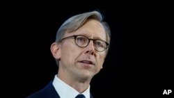 FILE - In this Nov. 29, 2018 file photo, Brian Hook, U.S. special representative for Iran, speaks at the Iranian Materiel Display at Joint Base Anacostia-Bolling in Washington. An expiring United Nations weapons embargo on Iran must remain in place…