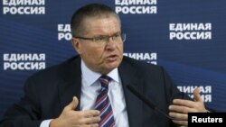 FILE - Russian Economy Minister Alexei Ulyukayev speaks during United Russia party congress in Moscow, Russia, Feb. 5, 2016. 