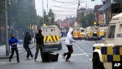 Loyalist rioters attack Police in East Belfast, Northern Ireland, June, 21, 2011