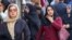 Women walk on a market street in Tehran on Sept. 15, 2024, on the second anniversary of a protest movement sparked by the death in custody of Mahsa Amini, arrested for allegedly violating the dress code for women. 