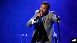 FILE - Jidenna performs during EBONY magazine's 30th Annual Power 100 Gala in Beverly Hills, California, Dec. 2, 2015. 