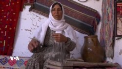 ژنێک لە کۆبانی هەوڵی پاراستنی هونەری کۆنی کوردەواری دەدات
