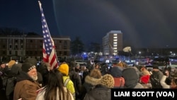 Protesters, police and media gathered at the Central Detention Facility prison in Washington late on Jan. 20, 2025, after U.S. President Donald Trump pardoned those convicted in the Jan. 6, 2021, U.S. Capitol riot.