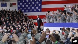 President Barack Obama is introduced at a Veteran's Day event at U.S. Army Garrison Yongsan in Seoul, South Korea, 11 Nov 2010
