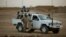 FILE - A vehicle with United Nations peacekeepers is seen in Kidal, Mali.