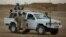 FILE - A vehicle with United Nations peacekeepers is seen in Kidal, Mali.