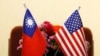 FILE - Flags of Taiwan and US in place for a meeting between US and Taiwan legislators in Taipei, Taiwan March 27, 2018.