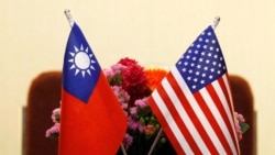 FILE - Flags of Taiwan and the U.S. are seen in place for a meeting between U.S. and Taiwan legislators in Taipei, Taiwan March 27, 2018.