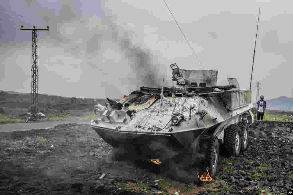 A U.N. armored personnel carrier burns during clashes with M23 rebels outside Goma, Democratic Republic of the Congo, Jan. 25, 2025.