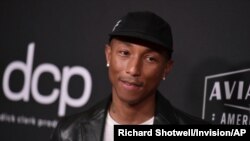 FILE - Pharrell Williams arrives at the 23rd annual Hollywood Film Awards at the Beverly Hilton Hotel in Beverly Hills, Calif. Taken Nov. 3, 2019.