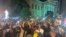 In a photo provided by Jada W., protesters gather Thursday, May 28, 2020, in downtown Louisville, Ky., against the police shooting of Breonna Taylor, a black woman fatally shot by police in her home in March.