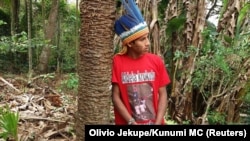 MC Kunumi poses for a photo in the Krukutu indigenous community, in the city of Sao Paulo, in October 2017. 