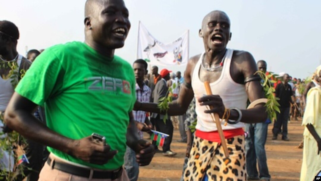 South Sudan men celebrate independence at a ceremony in Juba.