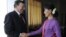Burma's opposition leader Aung San Suu Kyi shakes hands with European Commission President Manuel Barroso during their meeting in Naypyitaw, November 3, 2012. 