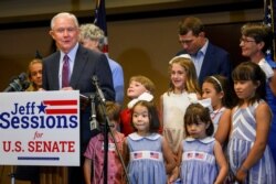 Former U.S. Attorney General Jeff Sessions, joined by family members, delivers his concession speech Tuesday, July 14, 2020, in Mobile, Ala.