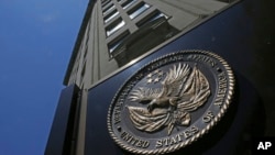 FILE - The seal is seen at the Department of Veterans Affairs building in Washington, June 21, 2013.