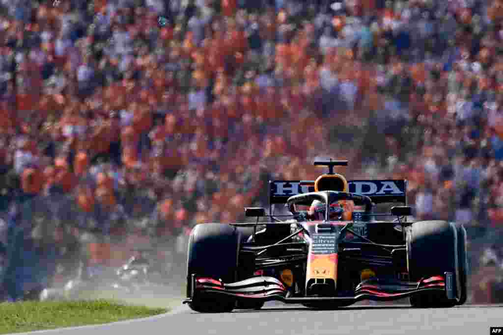 Red Bull&#39;s Dutch driver Max Verstappen races at the Zandvoort circuit during the Netherlands&#39; Formula One Grand Prix in Zandvoort, Netherlands.