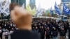 People protest at a rally to condemn South Korean President Yoon Suk Yeol's surprise declarations of the failed martial law and to call for his resignation in Seoul, South Korea, December 5, 2024. 