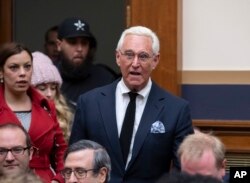FILE - Roger Stone, a confidant of President Donald Trump, enters the House Judiciary Committee hearing room on Capitol Hill in Washington, Dec. 11, 2018.