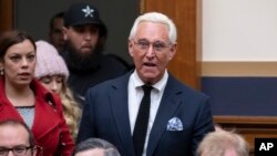 Roger Stone, a confidant of President Donald Trump, enters the House Judiciary Committee hearing room to hear testimony by Google CEO Sundar Pichai, on Capitol Hill in Washington, Dec. 11, 2018. 
