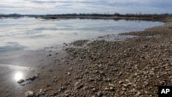 FILE - A view of the bank of the Drina River near the village of Amajlije, eastern Bosnia, Sunday, February 4, 2024.