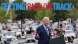 U.S. President Joe Biden attends the Democratic National Committee's "Back on Track" drive-in car rally to celebrate the president's 100th day in office at the Infinite Energy Center in Duluth, Georgia, U.S., April 29, 2021. 