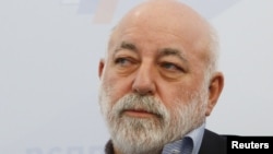 FILE - Renova Group founder Viktor Vekselberg attends a session during the Week of Russian Business, held by the Russian Union of Industrialists and Entrepreneurs, in Moscow, Feb. 7, 2018. 